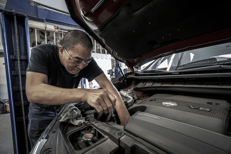 technician repair and maintenance engine of a car